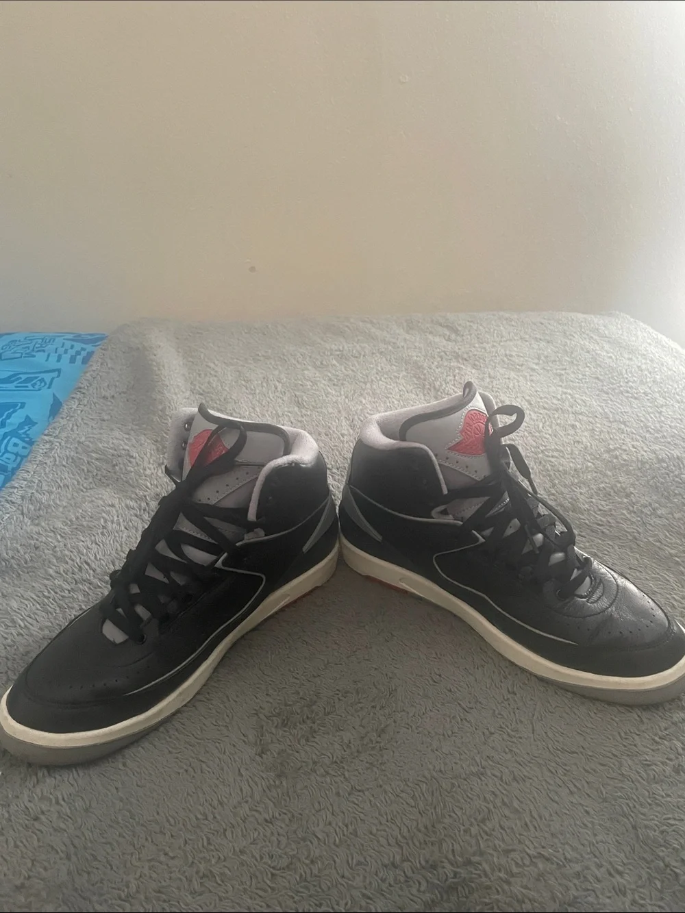 Jordan Men's Black and Gray High-Top Sneakers with Red Accent